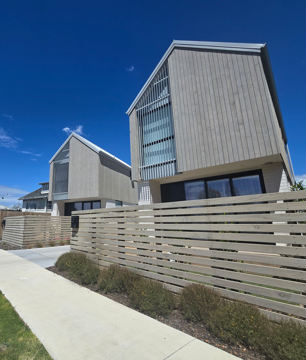 Titus development with fence and berm planting